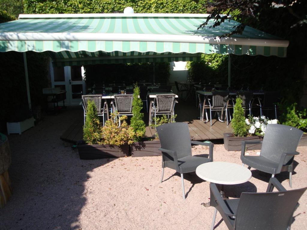 Hotel Du Commerce Tronget Rum bild
